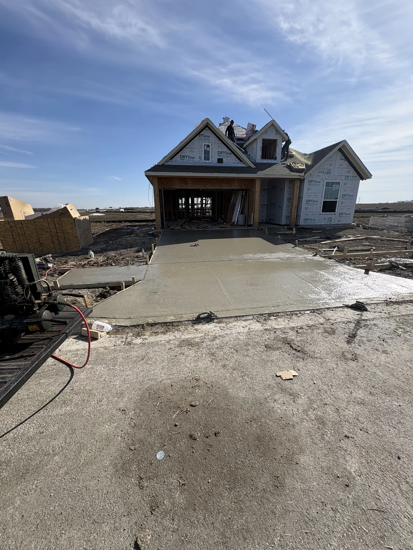 Creedmoor driveway concrete drying after pour