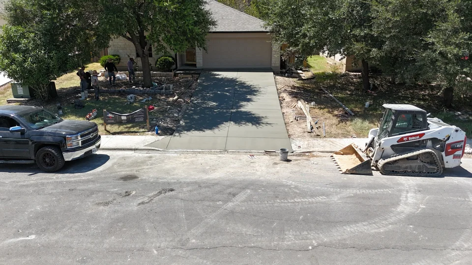 Aerial drone photo of the finished concrete driveway in Kyle, TX